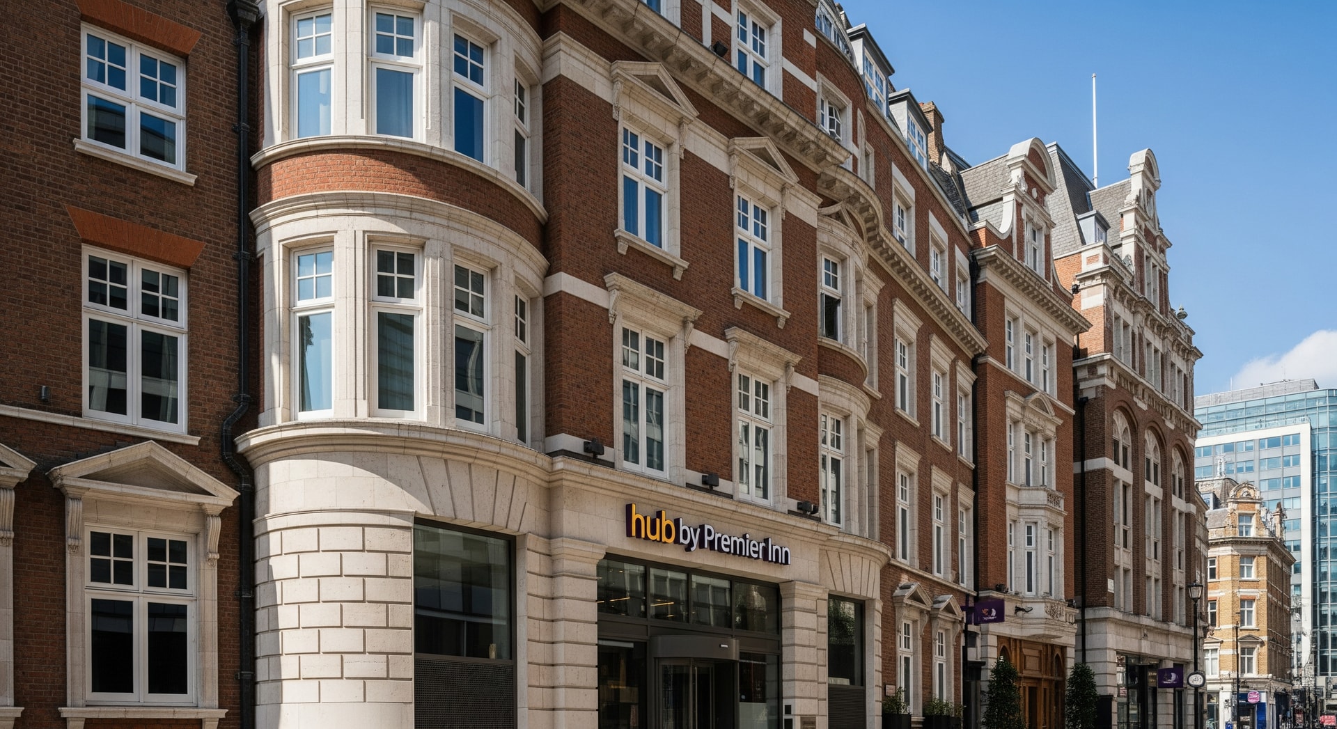 Exterior of a restored historic building in the City of London housing a hub by Premier Inn hotel