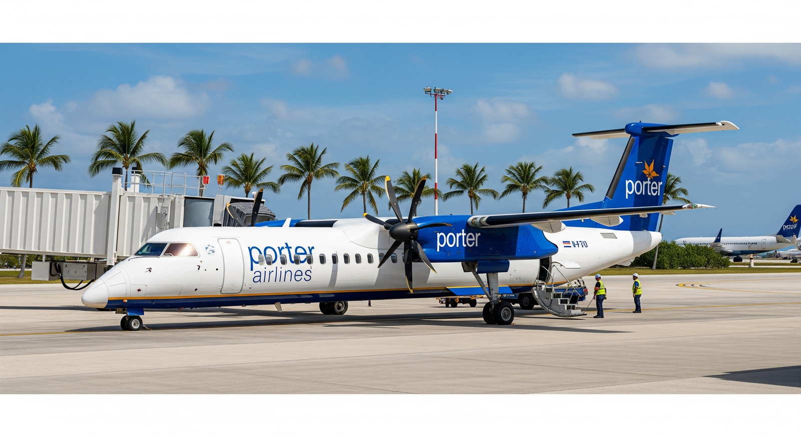 Porter Airlines aircraft at an airport gate, illustrating new nonstop Montreal to Nassau flights