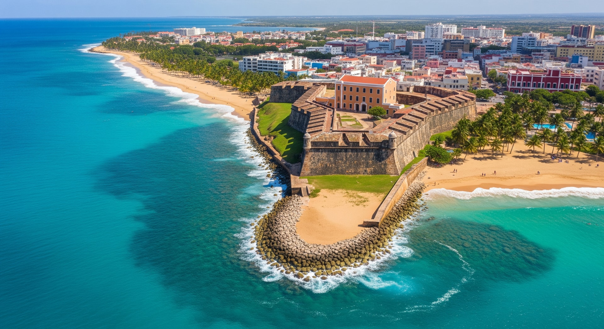 Aerial view of San Juan coastline with historic forts and coastal beaches, Puerto Rico tourism 2026