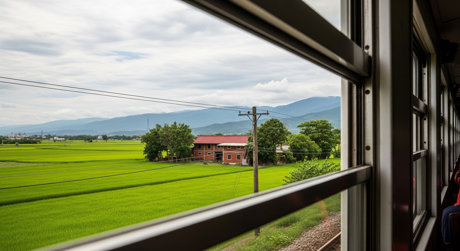 Scenic rail travel in Taiwan with countryside views from a tourism train window on the Tainan–Changhua corridor