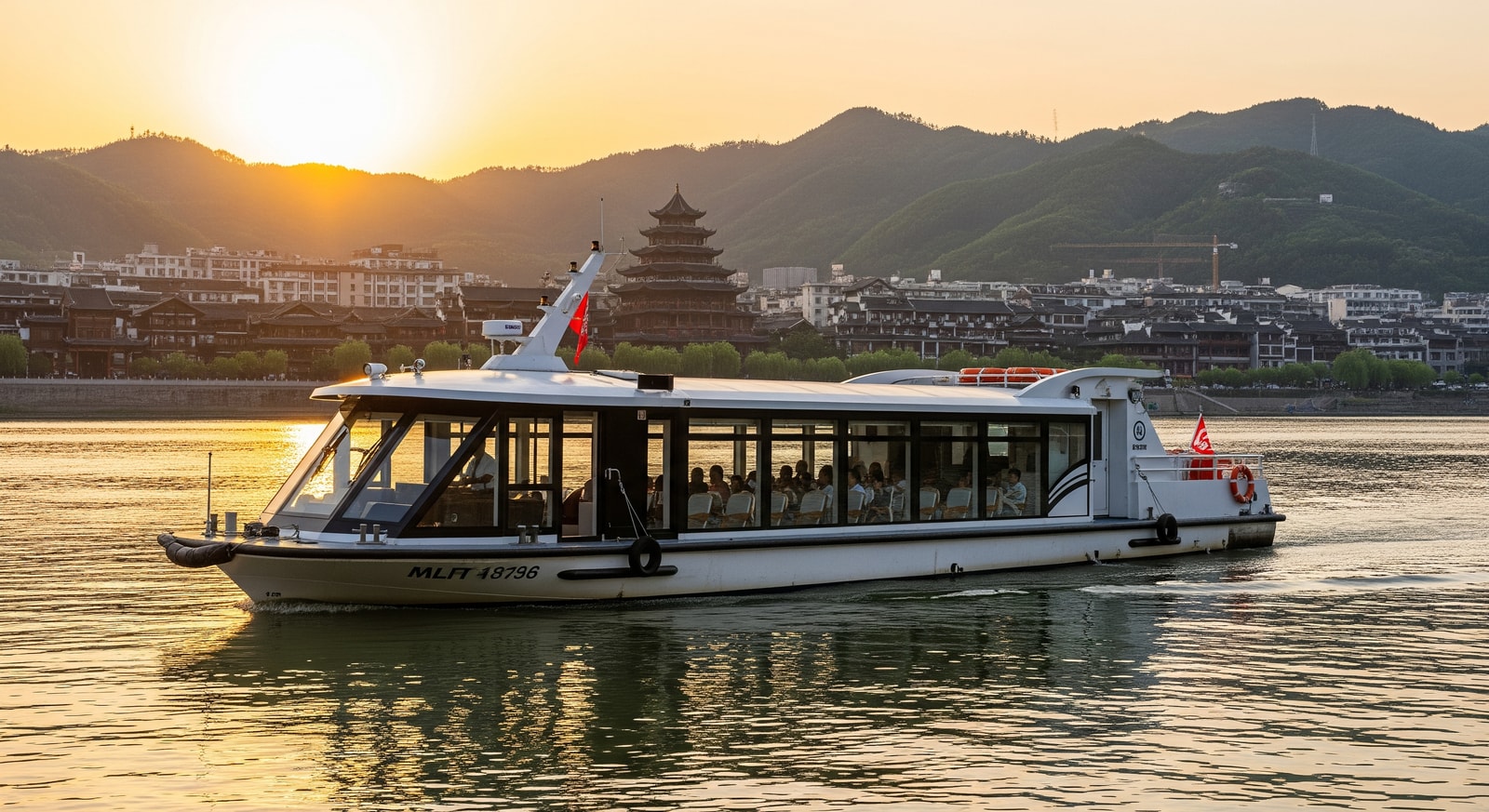Electric sightseeing vessel operating on inland waters in Yibin, Sichuan, China, highlighting sustainable river tourism